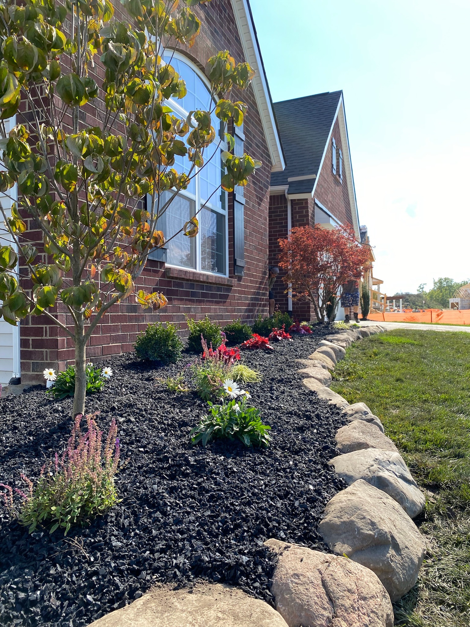 Why Fresh Mulch and Clean Bed Lines Make a Property Feel Finished